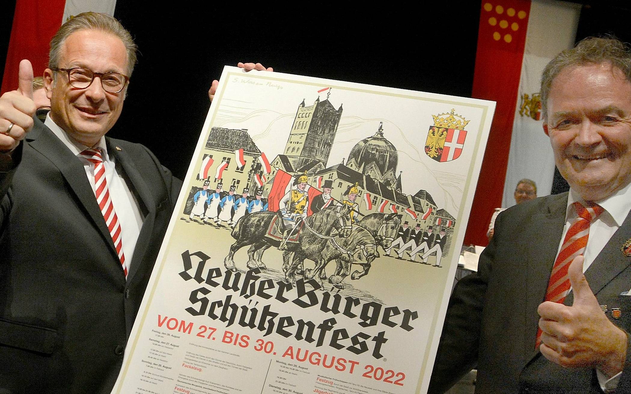  Bürgermeister Reiner Breuer und NBSV-Präsident Martin Flecken präsentieren das neue Schützenfest-Plakat.  