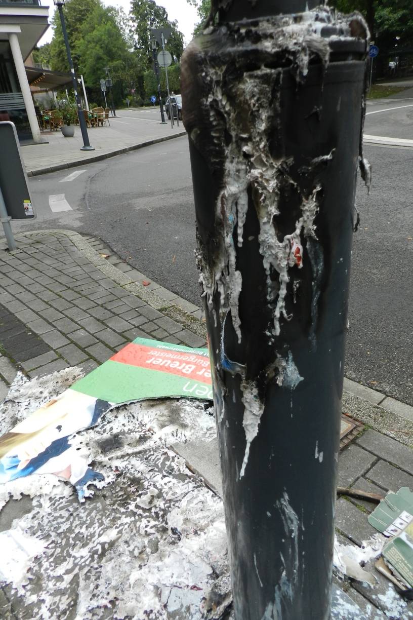 Wer hat das Reiner-Breuer-Plakat angezündet?