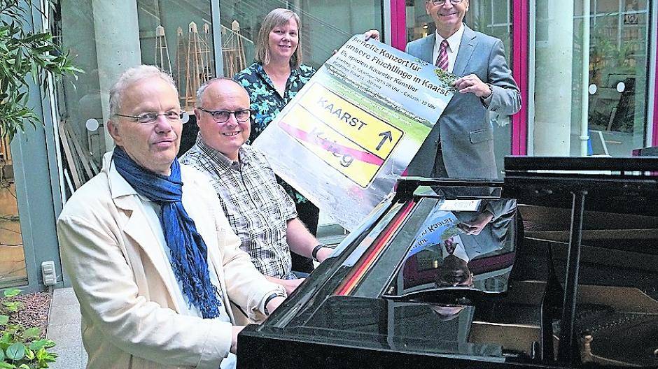 Musiker spielen für Flüchtlingshilfe